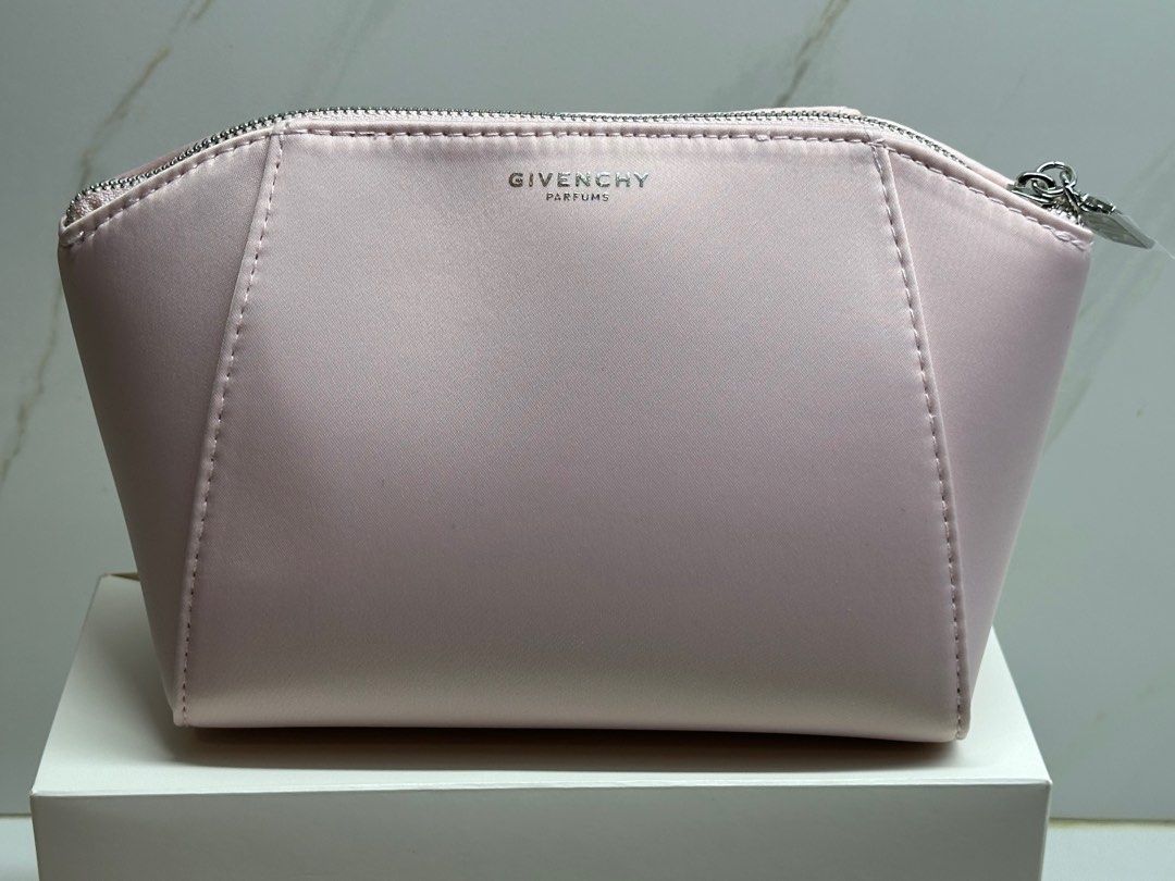 Givenchy Pink Pouch (Category: Luxury Bags & Wallets) located in Dasmarinas. Submitted by veryjennifer (Listing ID 1378299534, Image 3). Description: Original By Givenchy Parfums Brand new On hand Color light pink 2pc available With box.