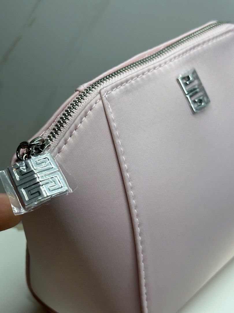Givenchy Pink Pouch (Category: Luxury Bags & Wallets) located in Dasmarinas. Submitted by veryjennifer (Listing ID 1378299534, Image 2). Description: Original By Givenchy Parfums Brand new On hand Color light pink 2pc available With box.