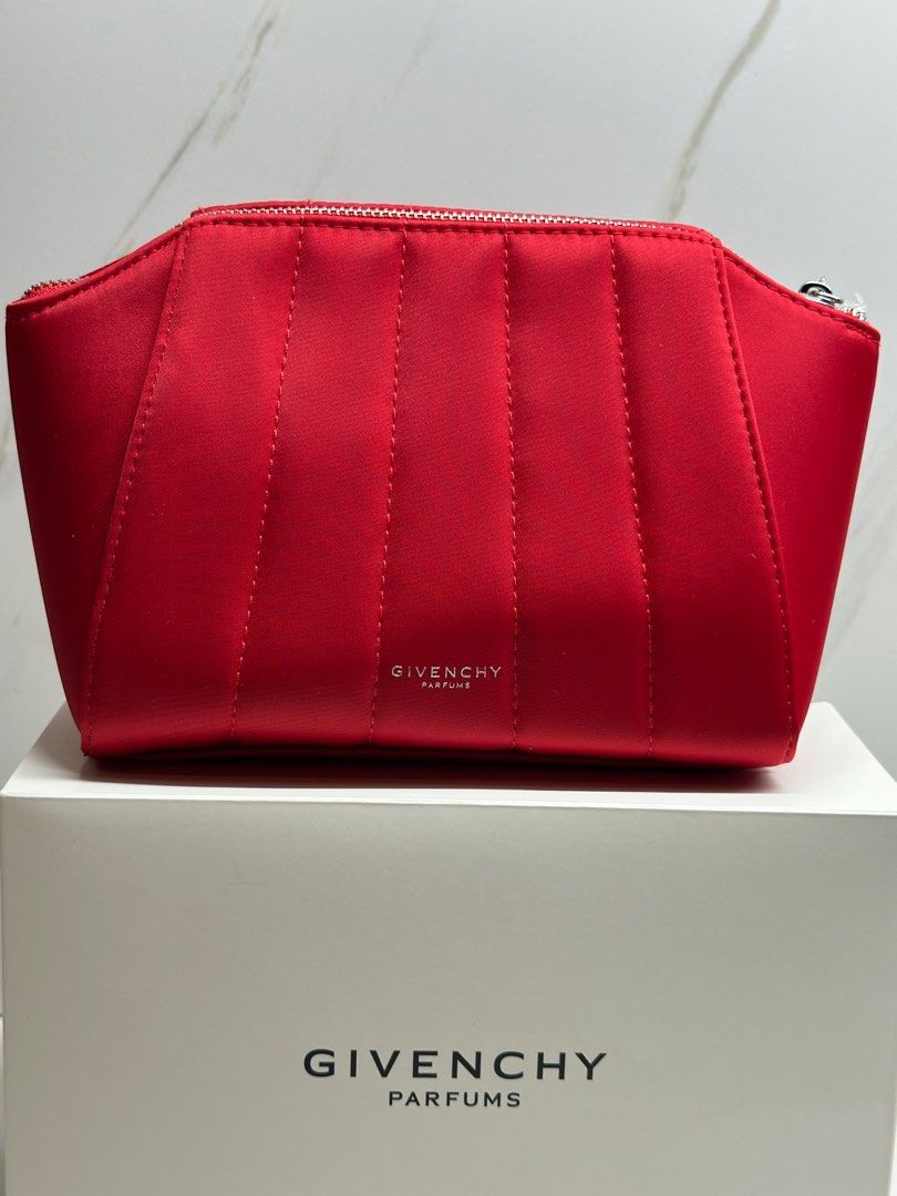 Givenchy Red Pouch (Category: Luxury Bags & Wallets) located in Dasmarinas. Submitted by veryjennifer (Listing ID 1378299818, Image 2). Description: Original By Givenchy Parfums Brand new On hand Color light pink 2pc available With box.