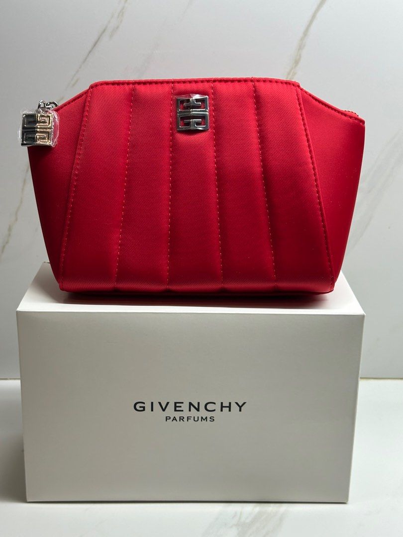 Givenchy Red Pouch (Category: Luxury Bags & Wallets) located in Dasmarinas. Submitted by veryjennifer (Listing ID 1378299818, Image 1). Description: Original By Givenchy Parfums Brand new On hand Color light pink 2pc available With box.