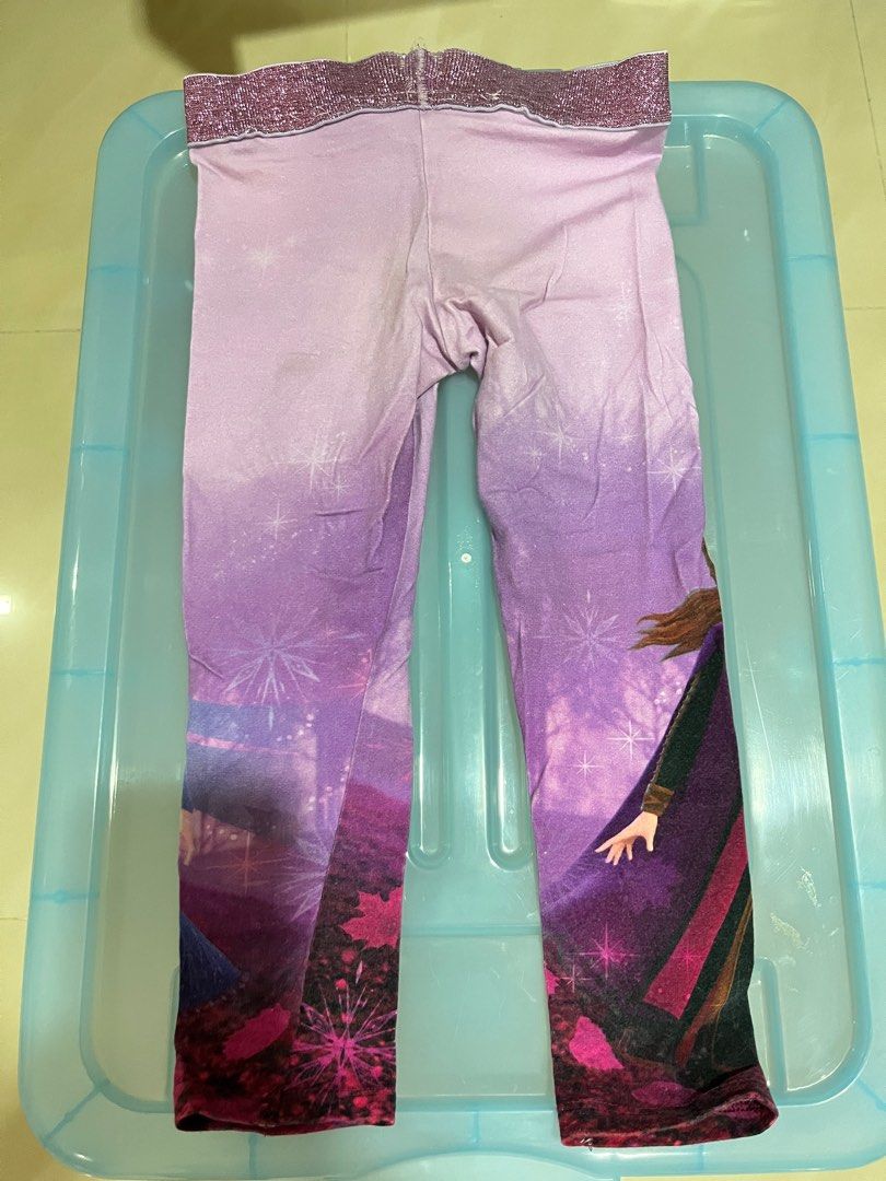 H&M Disney Frozen Leggings Size 4-5 (Category: Babies & Kids Fashion) located in Singapore. Submitted by piyojo (Listing ID 1378194493, Image 2). Description: Adorable H&M leggings featuring Anna and Elsa from Disney's Frozen. Size 4-5 years. Made in Turkey. The leggings have a sparkly waistband and a lovely purple gradient design. Perfect for any Frozen fan! Can meet up and sight the leggings before release cash payment on the spot. Strictly no 