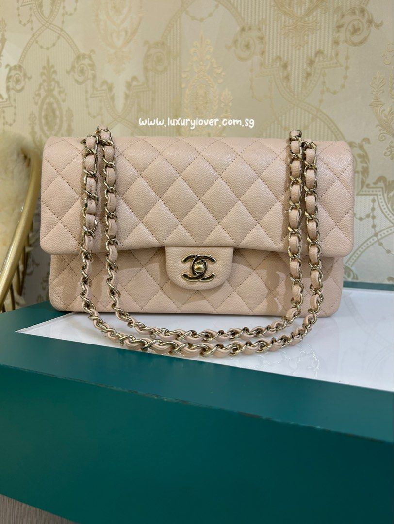LNIB Chanel 22C Classic Double Medium Flap Light Beige Caviar LGHW (Category: Bags & Wallets) located in Singapore. Submitted by luxuryloversg (Listing ID 1378092319, Image 1). Description: Microchipped, 22C Medium 25.5 x 15.5 x 6.5 cm Super gorgeous! Such a true beauty. Actual color is even nice than photos. Light beige with powder pink undertone 9.9/10, lightly used twice only, like new condition. No scuffing, no stains. Perfect shape. Leather 