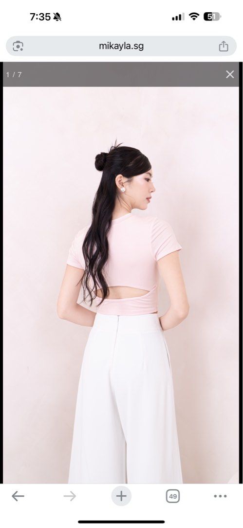 Mikayla Zenda Baby Tee Baby Pink (Category: Sleeveless) located in Singapore. Submitted by mbl_mbl (Listing ID 1378160563, Image 1). Description: Beautiful pink crop top from Mikayla.sg. Features a flattering cut with a back cutout. Made from a comfortable material. Please refer to the size chart in the images for measurements. Perfect for a stylish and chic look..