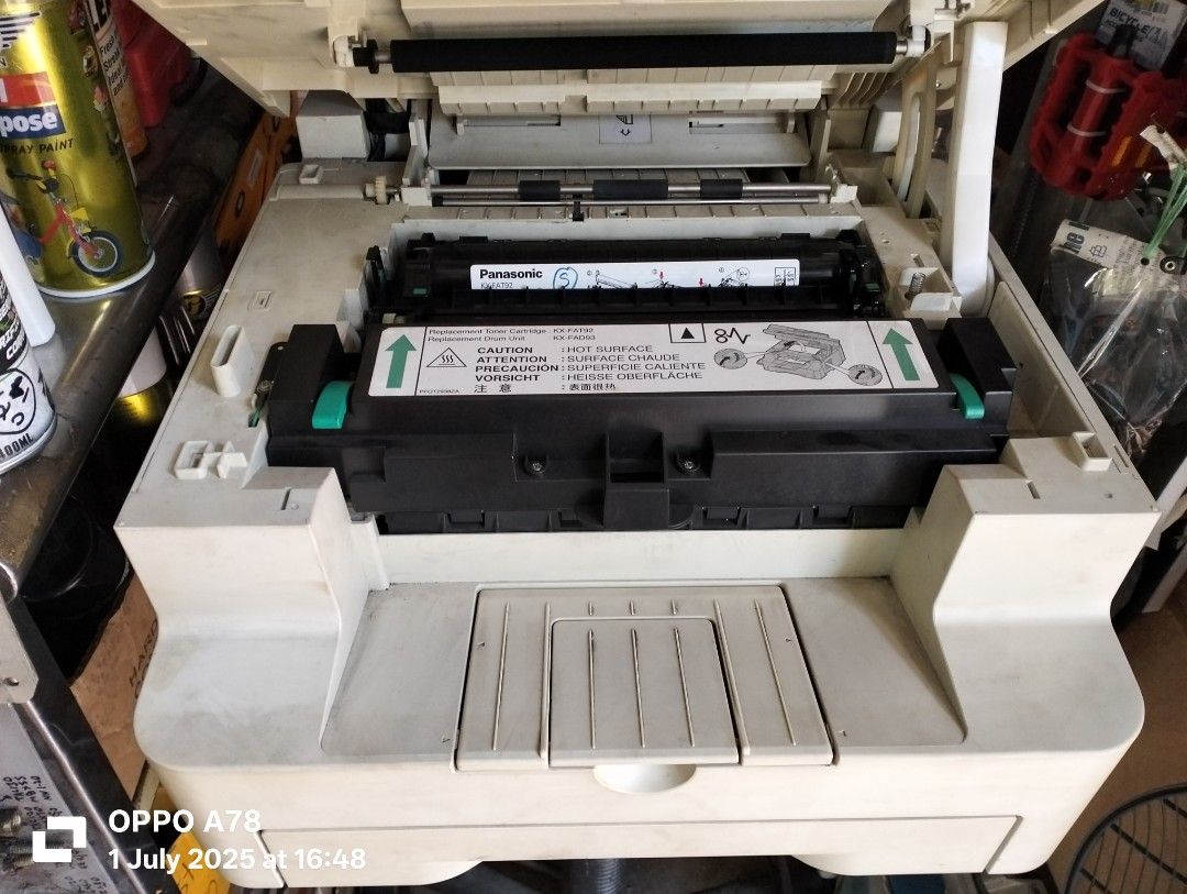 Multifunction Printer (Category: Printers, Scanners & Copiers) located in Singapore. Submitted by pbgresources (Listing ID 1378152725, Image 3). Description: - Panasonic KX-MB262 laser multifunction printer - Functions: Print, Scan, Copy - Features: Paper tray, flatbed scanner - Toner cartridge accessible - In good working condition.
