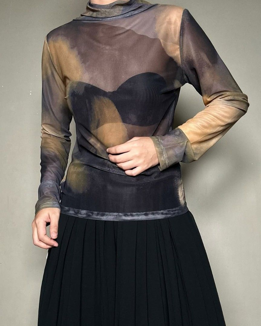 Printed Mesh Turtleneck (Category: Longsleeves) located in Manila. Submitted by hellojelo (Listing ID 1378312270, Image 3). Description: Fits small to medium frame Stretchy fabric RFS: Too small for me.
