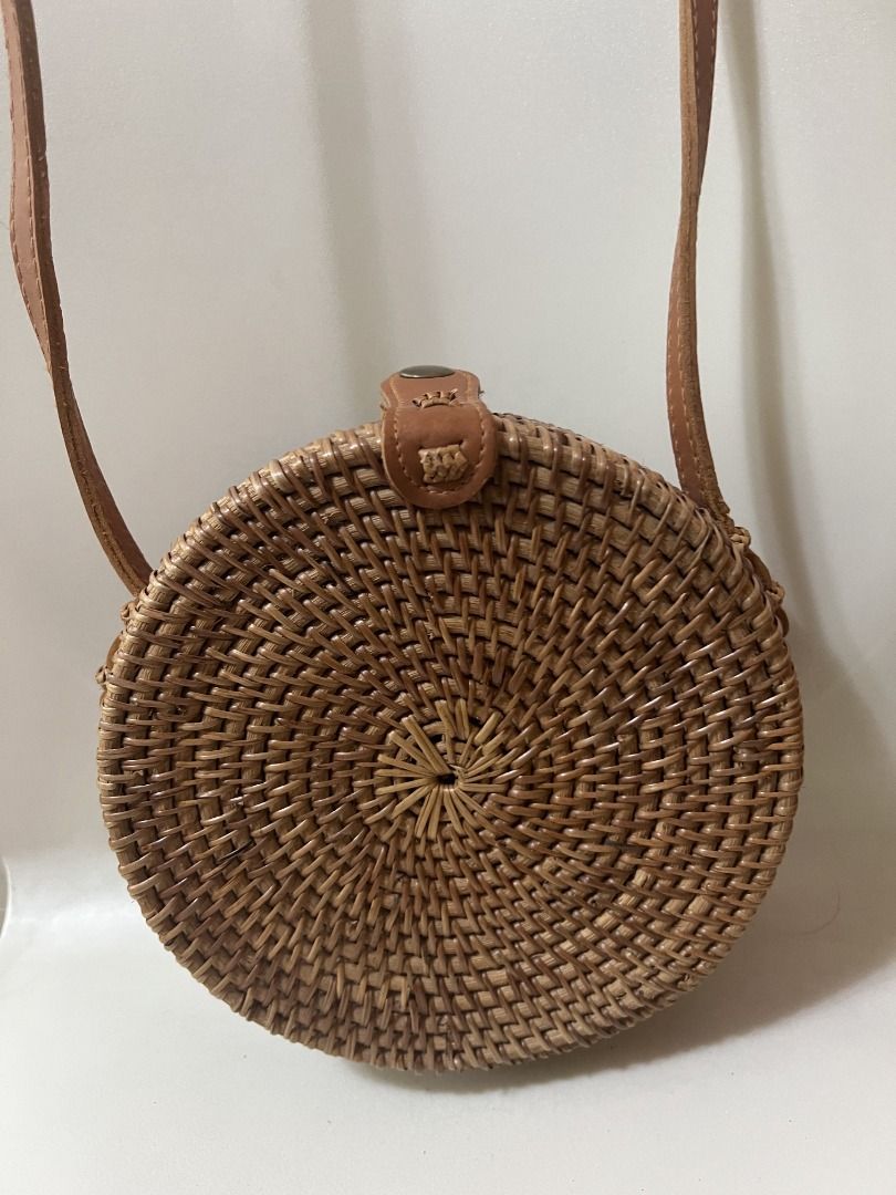 Round Circle Rattan Bag from Bali (Category: Cross-body Bags) located in Quezon City. Submitted by rinea (Listing ID 1378195442, Image 1). Description: - selling a round rattan bag purchased in Bali - crossbody type - never used outside, only tried to put things in - powerbank placed beside for size reference - can fit a 119 x 72 x 31.8 mm powerbank, iphone 13 and other essentials - send a msg if interested! thank you!.