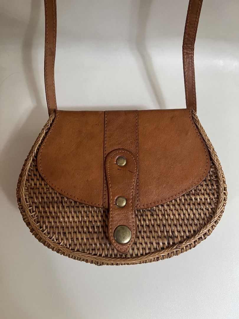 Round Wallet Rattan Bag from Bali (Category: Cross-body Bags) located in Quezon City. Submitted by rinea (Listing ID 1378194376, Image 1). Description: - selling a round wallet rattan bag purchased in Bali - unique design, crossbody type - never used outside, only tried to put things in - can fit a 119 x 72 x 31.8 mm powerbank, iphone 13 and other essentials - send a msg if interested! thank you!.