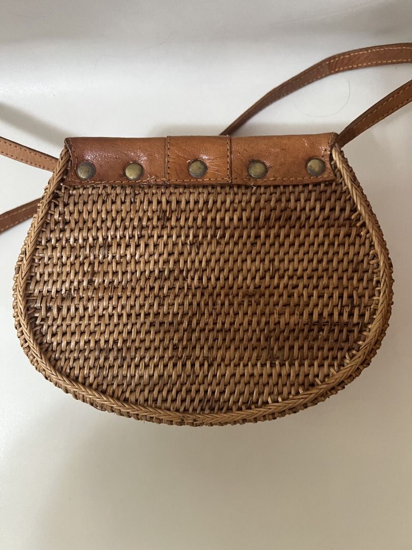 Round Wallet Rattan Bag from Bali (Category: Cross-body Bags) located in Quezon City. Submitted by rinea (Listing ID 1378194376, Image 2). Description: - selling a round wallet rattan bag purchased in Bali - unique design, crossbody type - never used outside, only tried to put things in - can fit a 119 x 72 x 31.8 mm powerbank, iphone 13 and other essentials - send a msg if interested! thank you!.