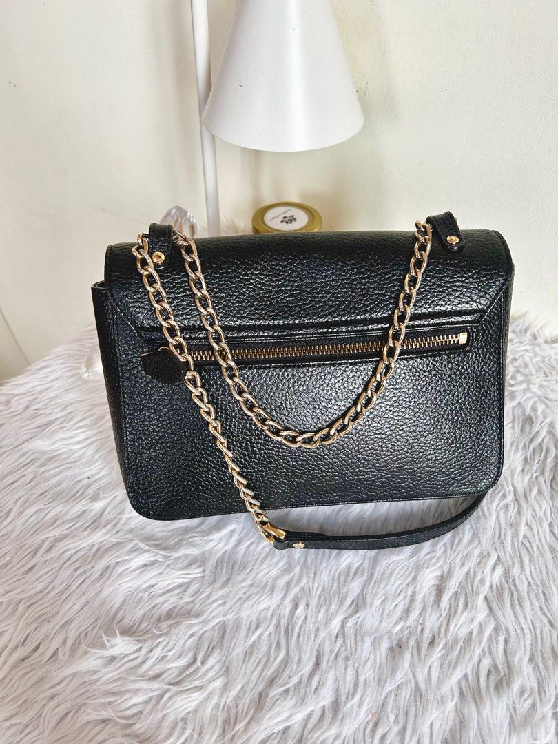 St. Scott London Convertible Sling Bag (Category: Cross-body Bags) located in Taguig. Submitted by clp26 (Listing ID 1378268791, Image 3). Description: Preloved St. Scott London Bag Convertible sling and should bag Black pebbled leather Gold hardware Leather and rubber linings in good condition With visible fadings in hardware L - 9” W - 32” H - 6.5”.
