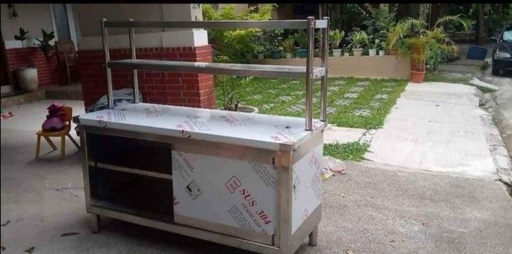 STAINLESS TABLE WITH CABINET FOR SALE (Category: Bathroom & Kitchen Fixtures) located in Manila. Submitted by davearonda40644 (Listing ID 1378325631, Image 1). Description: STAINLESS TABLE WITH CABINET IN ASSEMBLED TYPE MADE IN HIGH GRADE 304 STAINLESS STEEL WITH SLIDING DOOR 4 DIFFERENT SIZES FIX SIZE AND DESIGN ALL SIZES 100X60X80CM 120X60X80CM 150X60X80CM 180X60X80CM CASH ON DELIVERY SAME DAY DELIVERY.