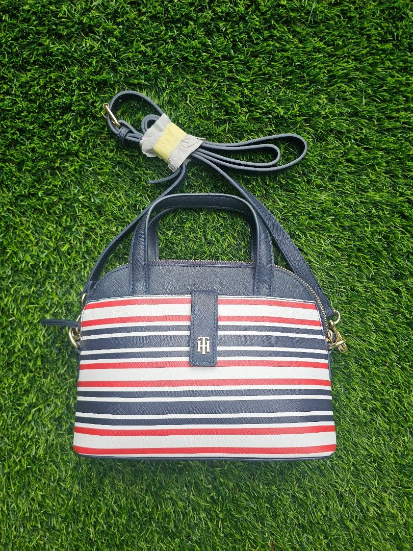 Tommy Hilfiger Stacey Mini Dome Handbag (Category: Cross-body Bags) located in Quezon City. Submitted by ysacam (Listing ID 1378200289, Image 1). Description: size: L 260mm x W 100mm x H 90mm price excluding shipping.