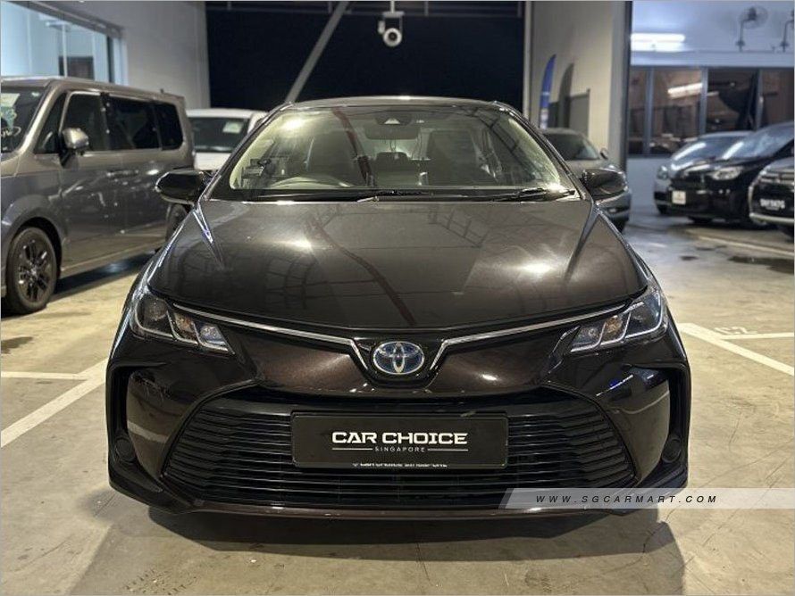 Toyota Corolla Altis Hybrid 1.8 (A) (Category: Used Cars) located in Singapore. Submitted by sgcarchoicewc (Listing ID 1378305514, Image 1). Description: 1 owner Solid condition Low maintenance Low fuel consumption High demand sedan Flexible loan available Warranty and servicing provided Huge boot space.