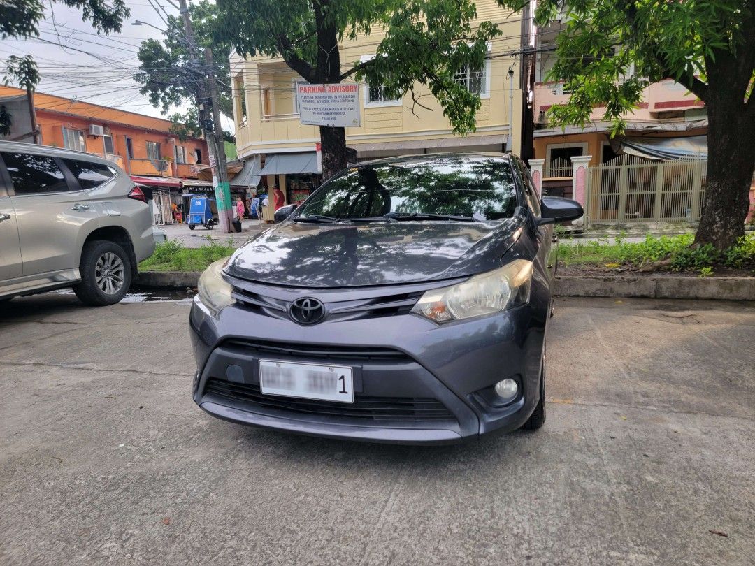 Toyota Vios 1.5 E (M) (Category: Used Cars) located in Quezon City. Submitted by gidzdlcrz (Listing ID 1378211314, Image 1). Description: Vios 1.3 E M/T (2017 Acquired) Year Model: 2016 Metallic Gray 65K ODO 2025 Registered Monday Coding (1) PMS Maintained (every 5k odo) Perfect Running Condition Complete Legal Papers THICK TIRES LONG DRIVE READY GAS AND GO Inclusions: Deep Dish Matting Black Painted Emblems De Chrome Accessories Genuine Yaris Em