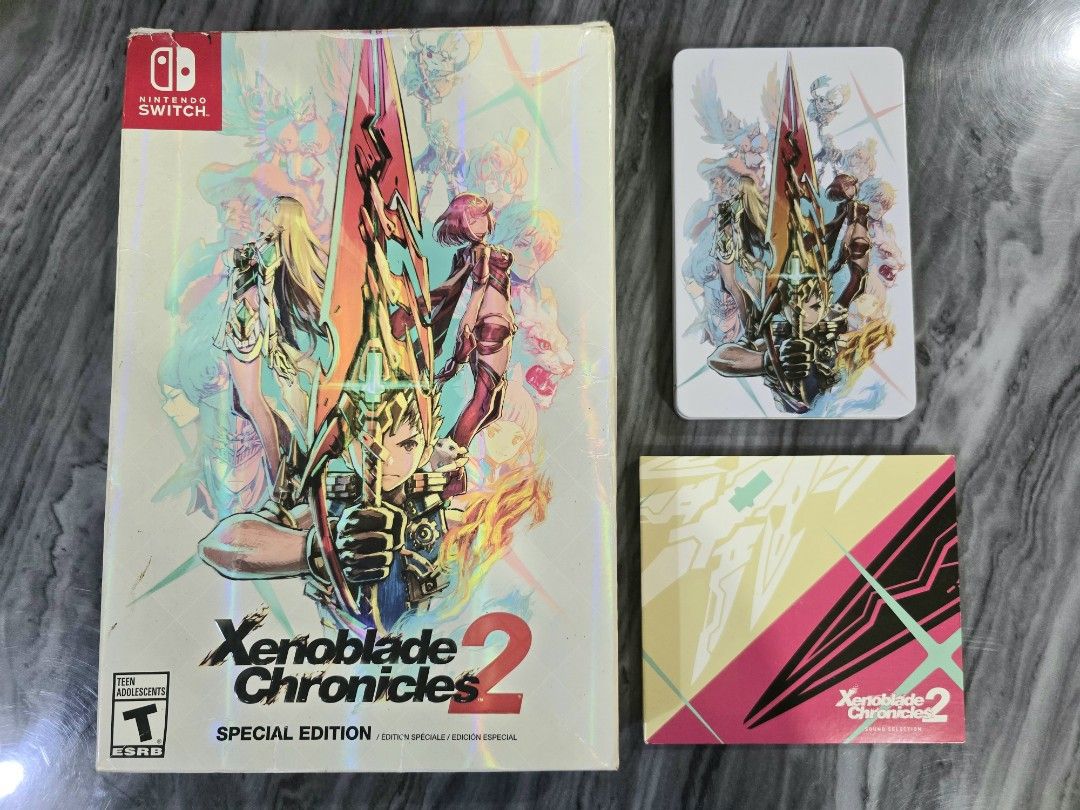 Xenoblade Chronicles 2 Special Edition for Nintendo Switch (Category: Nintendo) located in Mandaluyong City. Submitted by chan.ningtatum (Listing ID 1378305545, Image 1). Description: For sale! Xenoblade Chronicles 2 Special Edition (US Version) Includes: Big Box, Steelbook with Game, Soundtrack Good Working Condition. Authentic / Original Game Cartridge. Actual Photos Posted Checkouts via Shope e and Laz ada Available Shipping: Lalamove, Grab Me