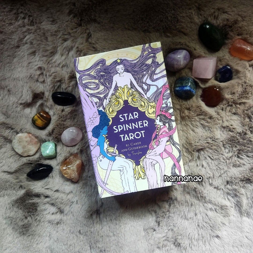[ AUTHENTIC TAROT ] Star Spinner Tarot Deck (Category: Storybooks) located in Manila. Submitted by hannahae (Listing ID 1381720294, Image 1). Description: ⊹₊⟡⋆ RFS: Rehoming & decluttering for my medication ⊹₊⟡⋆ CONDITION: Barely used, box and most cards are still in good condition but few cards were slightly dented due to storage but not noticeable, with guidebook ⊹₊⟡⋆ SHIPPING & PACKAGING NOT YET INCLUDED (to be paid by buyer) ⊹₊⟡⋆ SELLER'S LOC