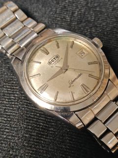 👑精品古董👑 OCTO瑞士製造樂都古董錶 60年代製造滿有歲月痕跡，古董味濃，原裝面烏螢字無番寫原汁原味，紅字日期顯示，原裝瑞士製21石手動上鏈機芯，已抹油行走精神，錶頭35mm不連錶的量度，原裝古董錶帶，淨錶一隻，觀塘港鐵站交收有意請pm 😷支持防疫，提供順豐服務😷64226445868035110