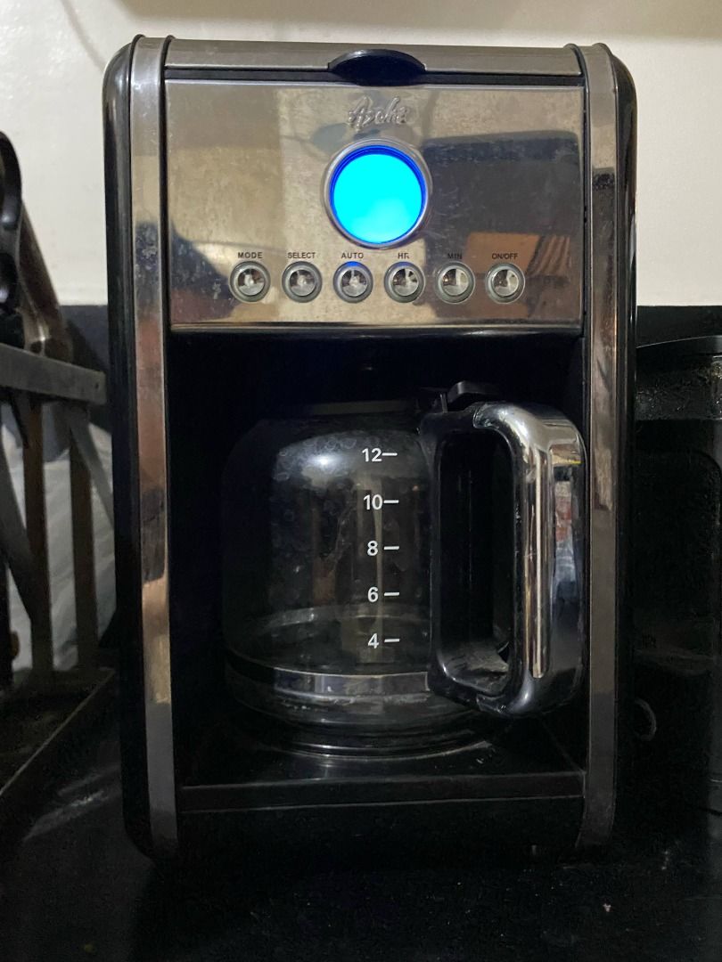 Asahi CM 033 Drip Coffee Maker 12 Cups (Category: Coffee Machines & Makers) located in Dasmarinas. Submitted by qphien (Listing ID 1381764317, Image 1). Description: Originally got it for : 2800 Php - Signs of use: watermarks and coffee stain ● Drip Coffee Maker ● 12-cup capacity ● 900W ● Glass carafe ● LCD display programming ● Re-usable/washable coffee filter ● Removable coffee basket ● Metal housing ● Drip stop feature ● Soft-button switch ● B