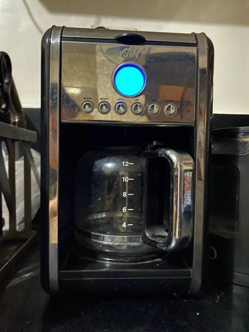 Asahi CM 033 Drip Coffee Maker 12 Cups (Category: Coffee Machines & Makers) located in Dasmarinas. Submitted by qphien (Listing ID 1381764317, Image 3). Description: Originally got it for : 2800 Php - Signs of use: watermarks and coffee stain ● Drip Coffee Maker ● 12-cup capacity ● 900W ● Glass carafe ● LCD display programming ● Re-usable/washable coffee filter ● Removable coffee basket ● Metal housing ● Drip stop feature ● Soft-button switch ● B