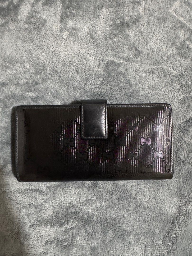 Authentic Gucci Guccissima Long Wallet Black (Category: Luxury Bags & Wallets) located in Bacoor. Submitted by crissxcross.ph (Listing ID 1381712764, Image 2). Description: Available for meetup at Ortigas (weekdays) and Bacoor (weekends). Available for shipping via Lalamove only. Payment Method: Gcash or Cash upon pickup or upon delivery (via Lalamove purchase service)..