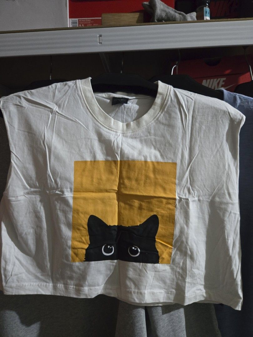 Cat Cropped Top (Category: Sleeveless) located in Las Pinas. Submitted by ctarandomstuff (Listing ID 1381838261, Image 1). Description: Worn twice tapos sumikip na. Bought in Thailand. Best fits medium to large..