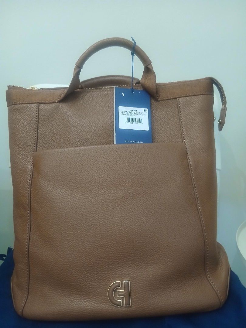 Cole Haan 4-way bag (Category: Luxury Bags & Wallets) located in Paranaque City. Submitted by melismendy (Listing ID 1381799130, Image 3). Description: bought in Cole Haan Conrad for 16k Multi-functional and versatile silhouette for everything from your daily commute to weekend adventures. Crafted in genuine leather. 13.5" x 13" x 3.5". 21" adjustable strap. 2.5" handle drop. Crafted in leather with a washable nylon interior and nylon straps. Sec