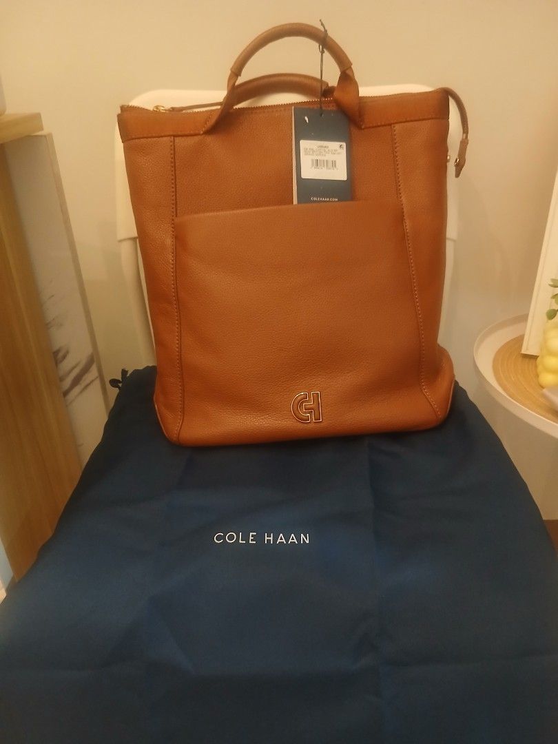 Cole Haan 4-way bag (Category: Luxury Bags & Wallets) located in Paranaque City. Submitted by melismendy (Listing ID 1381799130, Image 2). Description: bought in Cole Haan Conrad for 16k Multi-functional and versatile silhouette for everything from your daily commute to weekend adventures. Crafted in genuine leather. 13.5" x 13" x 3.5". 21" adjustable strap. 2.5" handle drop. Crafted in leather with a washable nylon interior and nylon straps. Sec