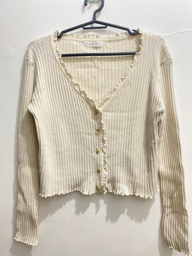 Cropped button-down cardigan (Category: Coats, Jackets and Outerwear) located in Cavite. Submitted by eessaa08 (Listing ID 1381893002, Image 1). Description: Color: cream Size: small to medium Item description: Knitted fabric, complete buttons, branded by March 11th Cropped cardigan. Best fit medium but can be worn as oversized for small frame MOP: Gcash MOD: Lalamove or Jnt Location: Cavite City.