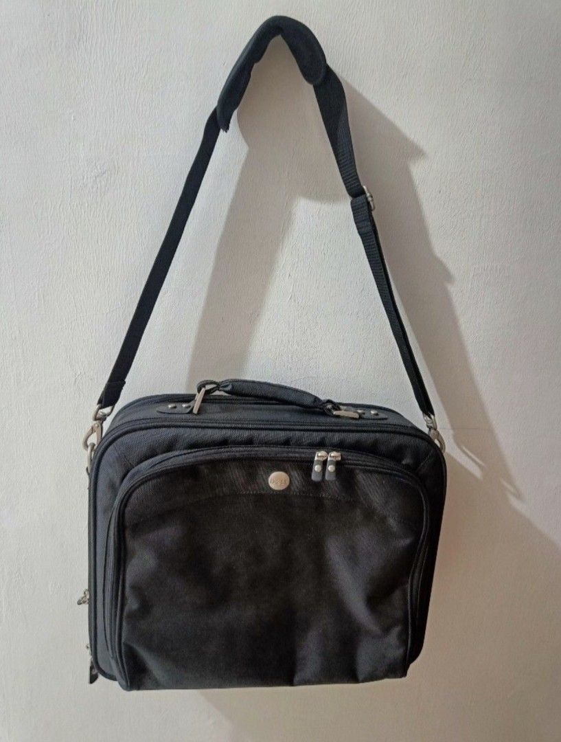 DELL Heavy Duty Laptop Briefcase Bag (Category: Laptop Bags & Sleeves) located in Baguio. Submitted by skwaterskalper (Listing ID 1381778093, Image 1). Description: DELL Heavy Duty Laptop Briefcase Bag 18" x 14" x 4" With shoulder Strap +Like New Condition Heavy Duty Bag +Shipping fee Gcash Payment (0931 128 5121)Next Day Shipping Send full shipping details once settled(Name/Address/Contact #) FB@SkwaterSkalper.