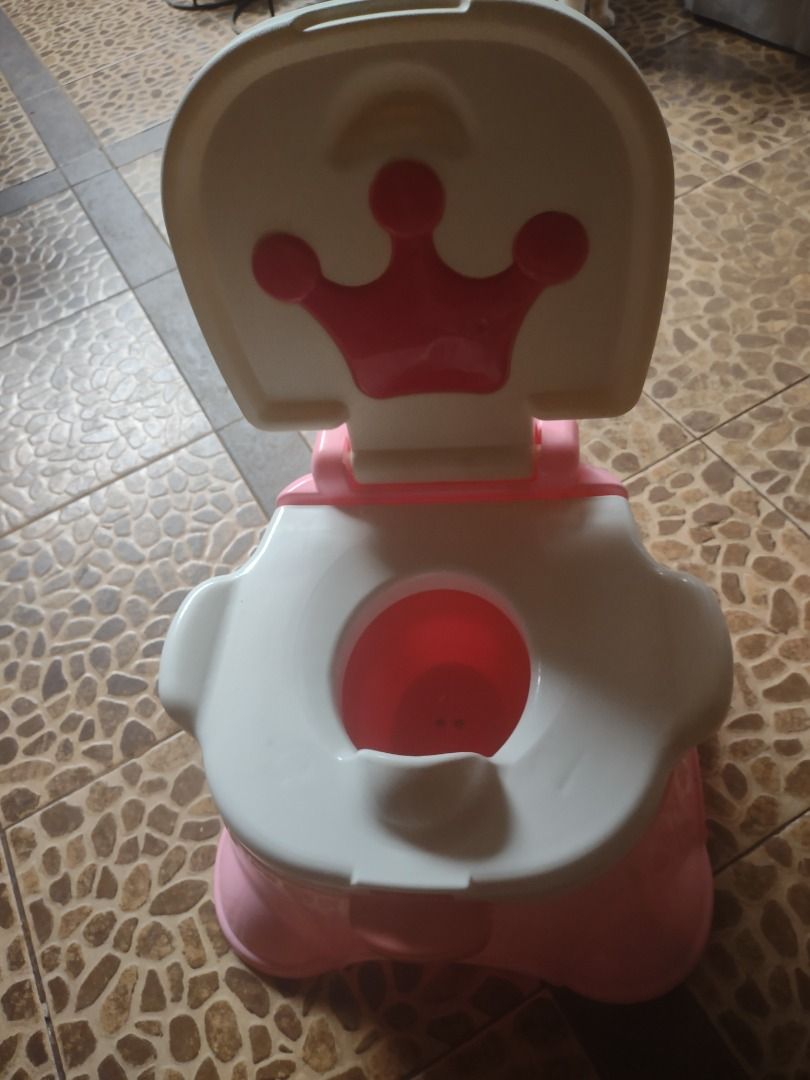 Fisher Price 'Princess' potty/stepstool (Category: Toilet Training) located in Makati City. Submitted by milo-milo (Listing ID 1381738368, Image 1). Description: Does not come with the musical box. Used less than five times then put away (to gather dust)... Can be disassembled for easy cleaning. .
