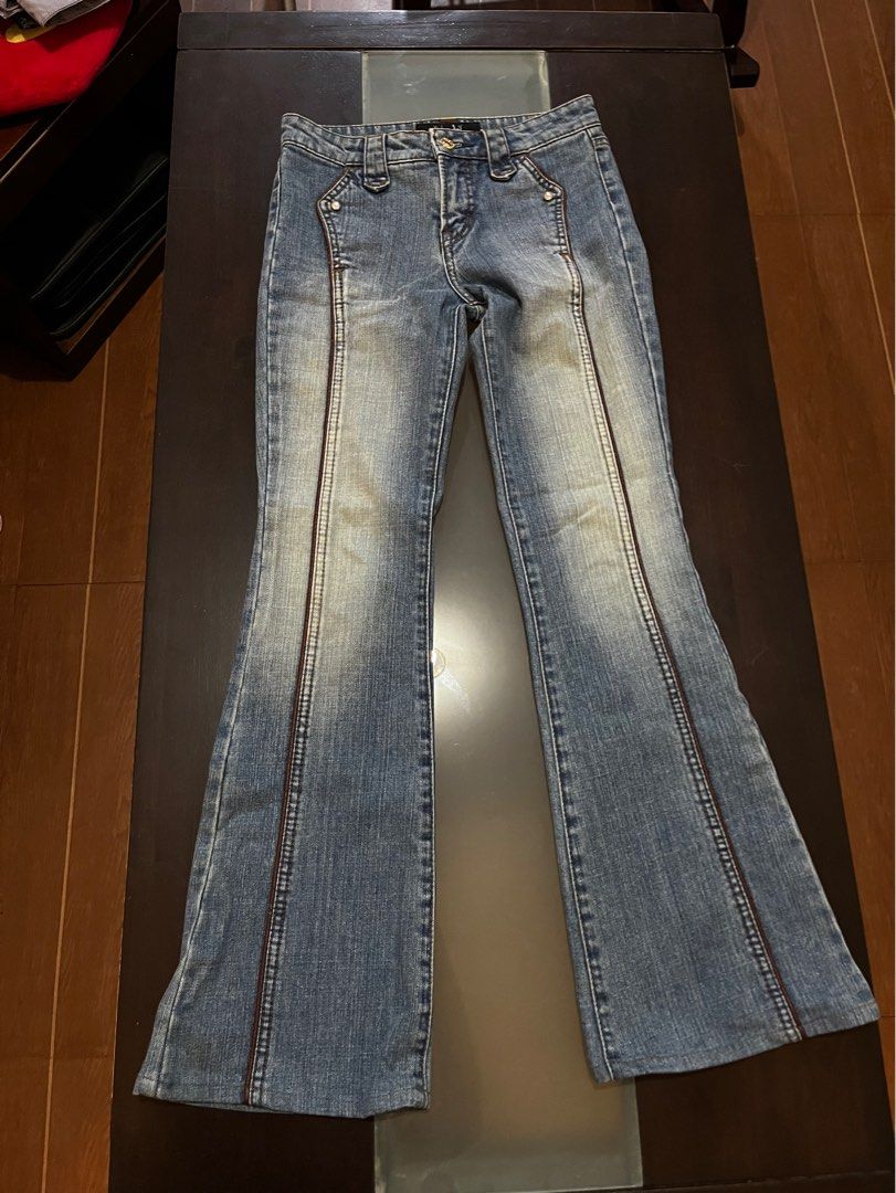 Vintage low rise Flare Pants bootcut pants (Category: Jeans) located in San Pablo. Submitted by keroppi._. (Listing ID 1381816068, Image 3). Description: Nuve jeans lowrise length - 35 inches waist - 26 inches Rise - 9 inches Leg opening - 9 inches Model is 5’5” Super cute nito😭 Bought here on Carousell din, worn once lang but decided to sell na since its too tight kaya kinda uncomfortable on me</3 Nice denim! Thoroughly washed na din Small back
