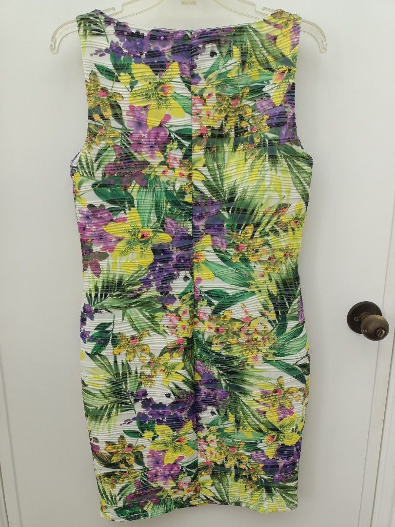 JENNIFER LOPEZ DRESS (Category: Dresses) located in Pasig City. Submitted by leaves21 (Listing ID 1381720494, Image 3). Description: - Brand: Jennifer Lopez - Size: Medium - Material: Polyester-Spandex - Has Polyester lining inside - W/ textured curved lines - pre-owned and in good condition.