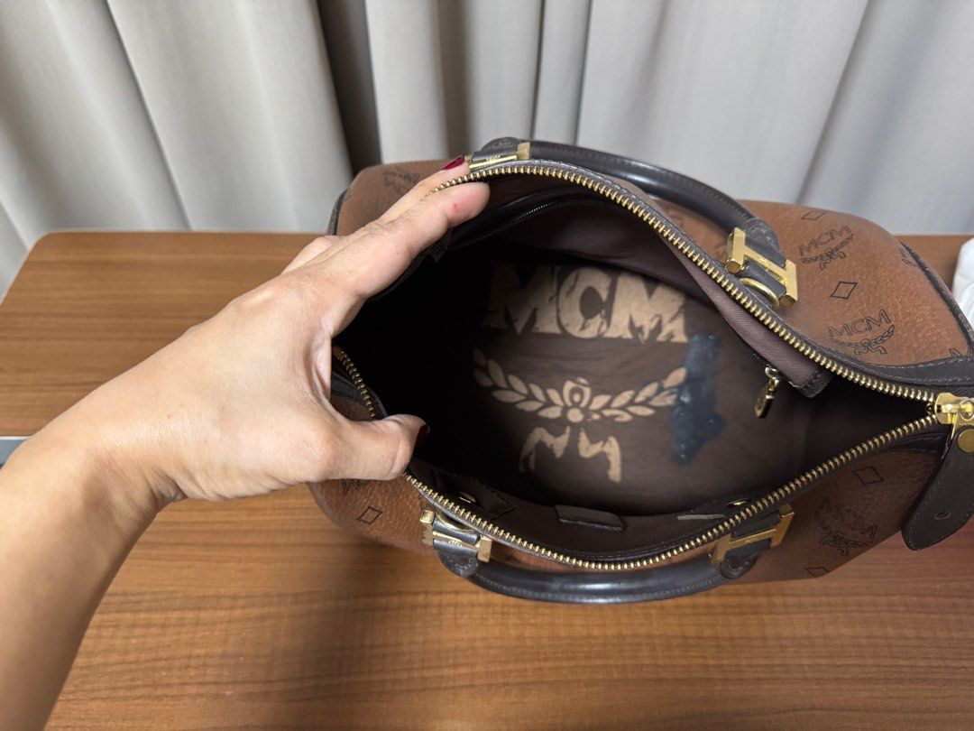 MCM Doctor's Bag (Category: Luxury Bags & Wallets) located in Manila. Submitted by djanggran20074 (Listing ID 1381718091, Image 3). Description: MCM Doctor’s Bag • Classic design, stylish and spacious • Gently used condition • Note: Has a stain inside (see photo) • Priced to reflect condition DM for details or more photos! .