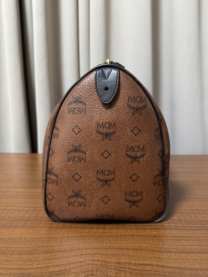 MCM Doctor's Bag (Category: Luxury Bags & Wallets) located in Manila. Submitted by djanggran20074 (Listing ID 1381718091, Image 2). Description: MCM Doctor’s Bag • Classic design, stylish and spacious • Gently used condition • Note: Has a stain inside (see photo) • Priced to reflect condition DM for details or more photos! .