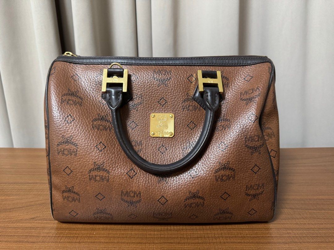 MCM Doctor's Bag (Category: Luxury Bags & Wallets) located in Manila. Submitted by djanggran20074 (Listing ID 1381718091, Image 1). Description: MCM Doctor’s Bag • Classic design, stylish and spacious • Gently used condition • Note: Has a stain inside (see photo) • Priced to reflect condition DM for details or more photos! .