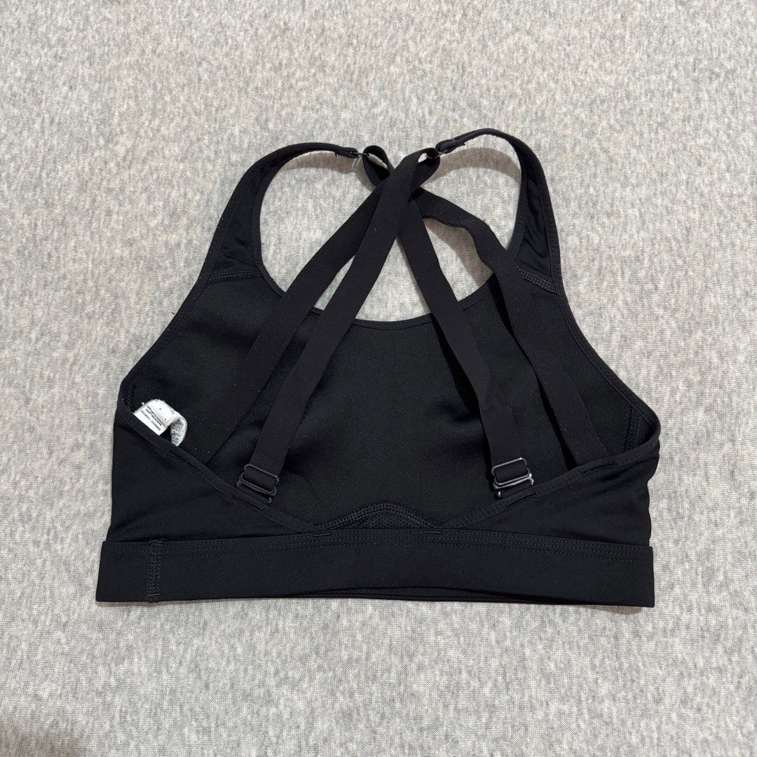 Nike sports bra (small) (Category: Activewear) located in Mabalacat. Submitted by amrcdo (Listing ID 1381724958, Image 2). Description: Nike sports bra in black size small on tag with built-in pads with complete tags! 🤩 criss cross back, super nice when worn 😍 like new condition! minor flaw: crack print on logo but only visible when super stretched!.