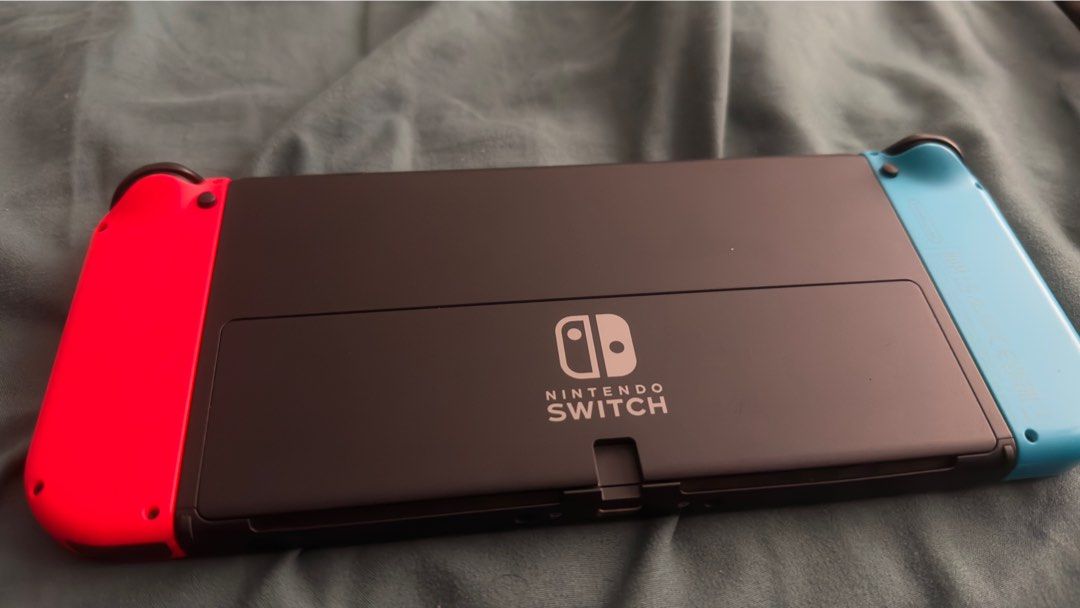 Nintendo Switch Oled (with Games + Controller)63108085916675111