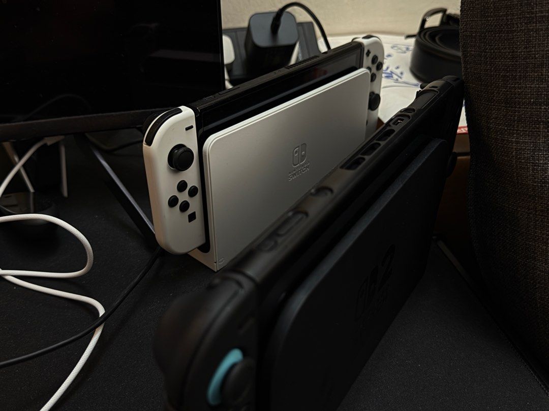Switch OLED (Category: Nintendo) located in Singapore. Submitted by ms.green73 (Listing ID 1381781105, Image 1). Description: 2024 Dec got this. Only play few. Now replace with switch 2.