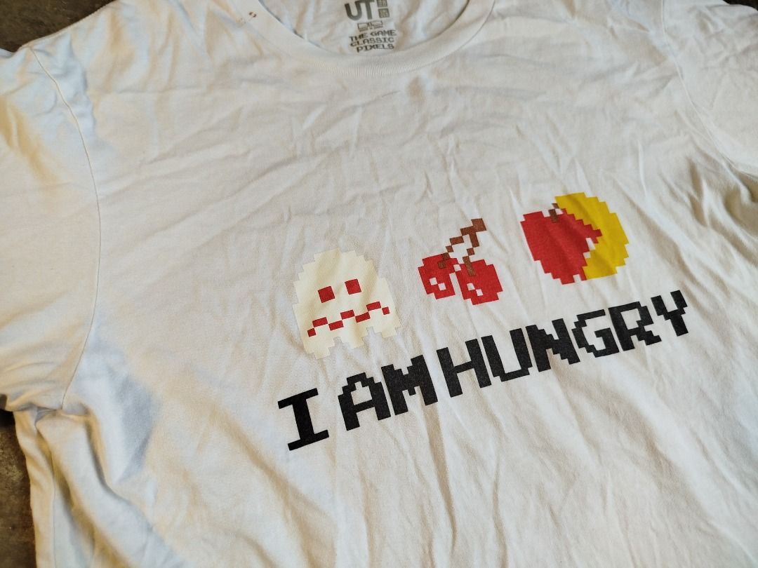 UNIQLO 8BIT PACMAN PIXEL SHIRT (Category: Tshirts & Polo Shirts ) located in San Jose del Monte. Submitted by entropythrifts (Listing ID 1381834164, Image 3). Description: 180+SF * Good Condition * XL on tag * 23 WIDTH * 29 Length -- ISSUES // SEE PICTURES -- * minor signs of usage * small Rust stain (seems washable) * Mode of Payment: GCASH / BPI * Mode of Delivery: JNT Disclaimers: Shipping not Included All items Need Wash Color may vary due to