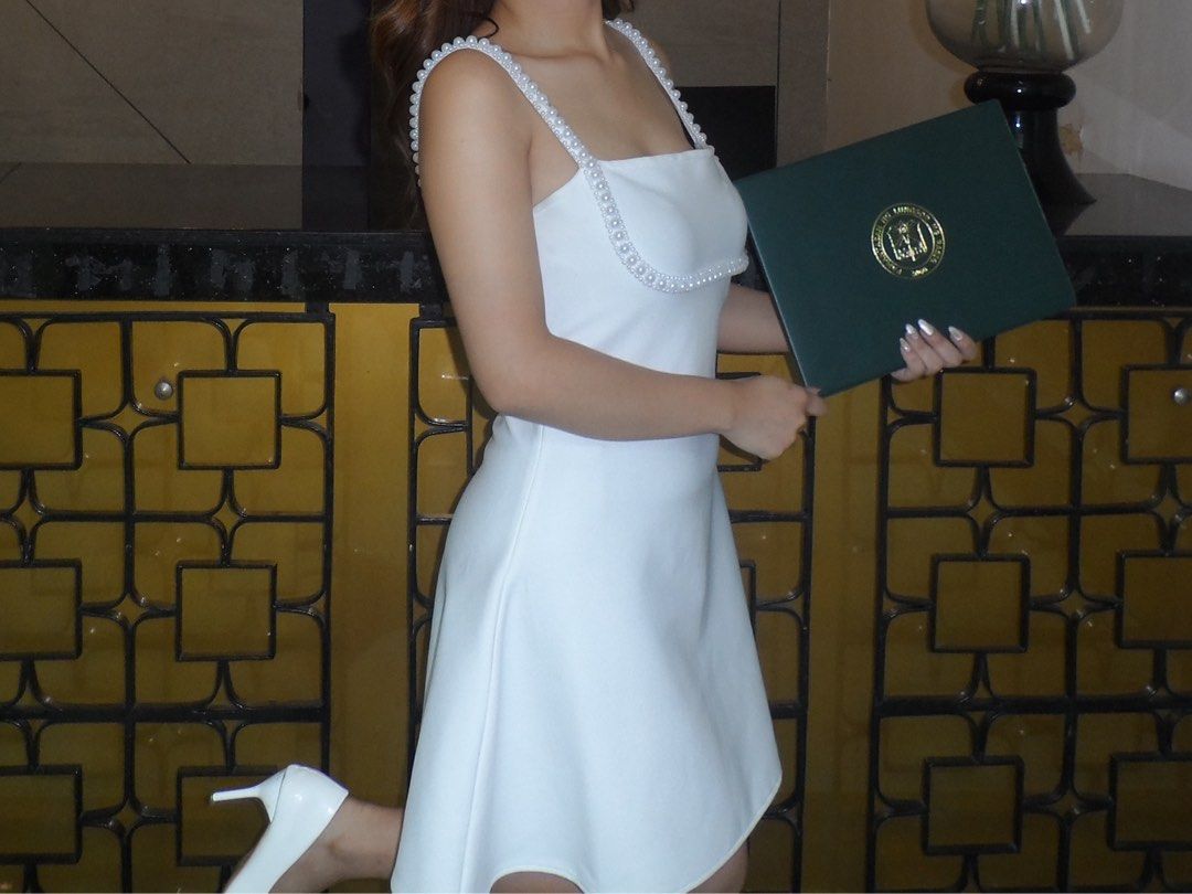 White Dress (Category: Dresses) located in Pasig City. Submitted by declutterisreal (Listing ID 1381884813, Image 2). Description: Pinang grad lang!! Used once Sobrang ganda ng tela HIGH QUALITY.
