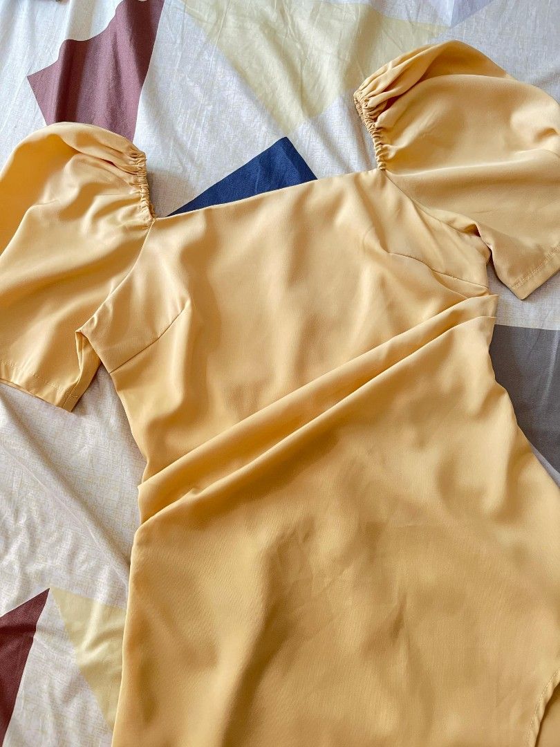 Yellow Asymmetrical Puff Dress (Category: Dresses) located in Quezon City. Submitted by jarsonjae (Listing ID 1381668813, Image 3). Description: High quality fabric Size XS-S W: 26 L: 33.