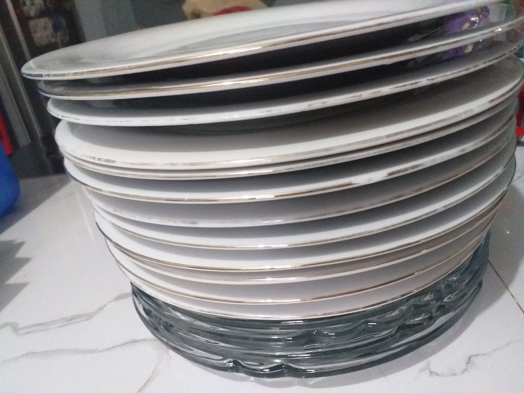 12-pcs Dinner plate unused 10",380php only (Category: Pitchers & Dispensers) located in Manila. Submitted by pickbuy.426 (Listing ID 1381971401, Image 3). Description: 12-pcs dinner plate nastock lng s cabinet,dinisplay lang Yong iba medyo kumupas yong gold line nya white 10" 180 only + sf breakable.