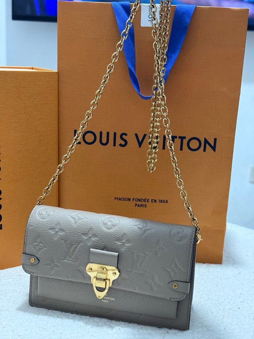 Authentic Lv Vavin Wallet on chain (Category: Luxury Bags & Wallets) located in Quezon City. Submitted by jhaediah (Listing ID 1382024598, Image 2). Description: Vavin Woc Like New Microchip code 1.