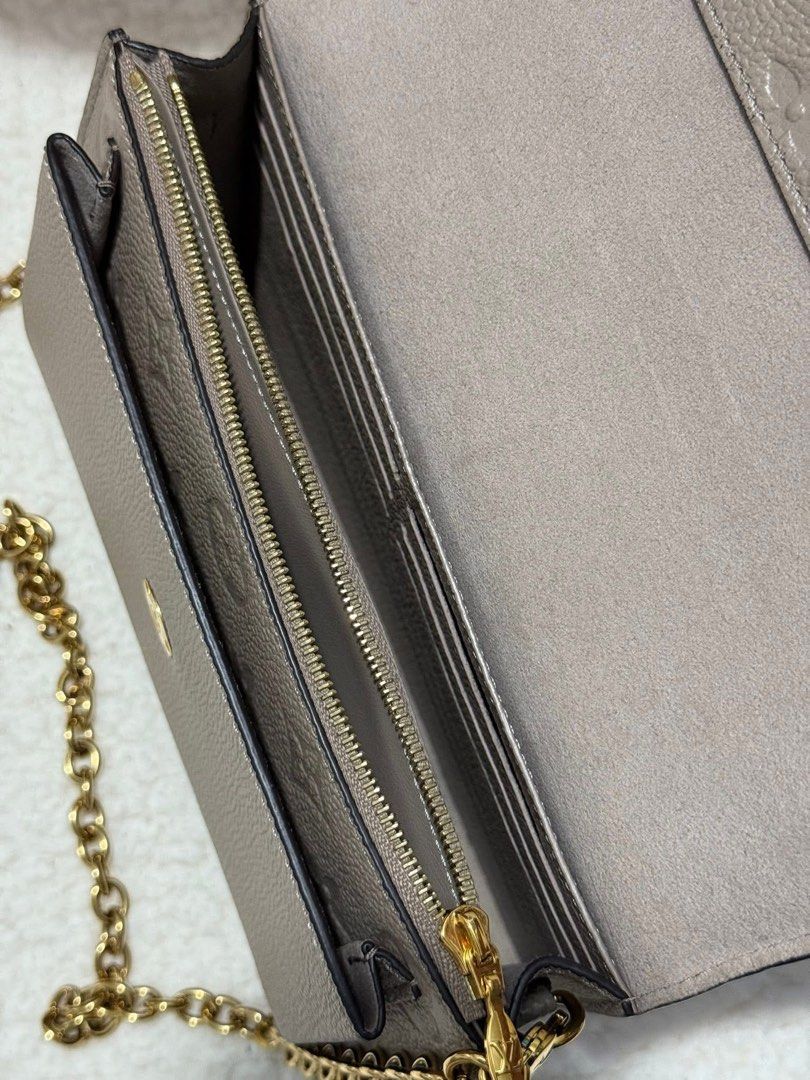 Authentic Lv Vavin Wallet on chain (Category: Luxury Bags & Wallets) located in Quezon City. Submitted by jhaediah (Listing ID 1382024598, Image 3). Description: Vavin Woc Like New Microchip code 1.