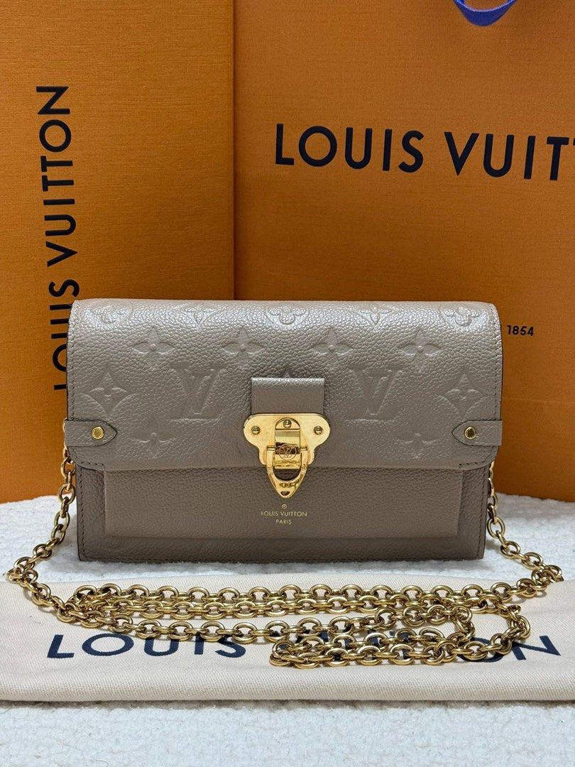 Authentic Lv Vavin Wallet on chain (Category: Luxury Bags & Wallets) located in Quezon City. Submitted by jhaediah (Listing ID 1382024598, Image 1). Description: Vavin Woc Like New Microchip code 1.