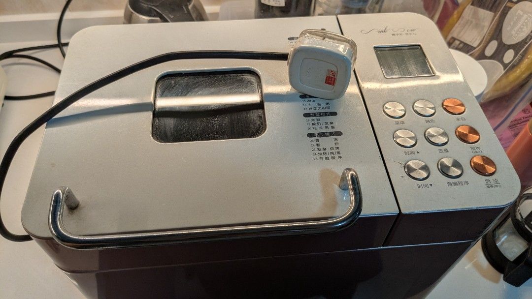Bread Maker - Used (Category: Breadmakers) located in Singapore. Submitted by purplespirit8 (Listing ID 1381924150, Image 5). Description: - Used bread maker -multiple functions for making different type of breads, jam, meat floss, etc -press a button for next morning bread loaf - Some rust present (see photos).