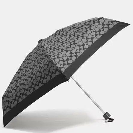 Coach Mini Umbrella (Category: Umbrellas) located in Manila. Submitted by shopaholic_gurl (Listing ID 1280193535, Image 3). Description: New with tags Original coach item from US Durable Nylon Fabric: Made from a lightweight yet durable nylon material for long-lasting use. Compact Size: With a round shape and one size, this mini umbrella is easy to carry and store. Signature Style: Features a stylish design with Coach’s iconic logo and Kaffe Fass