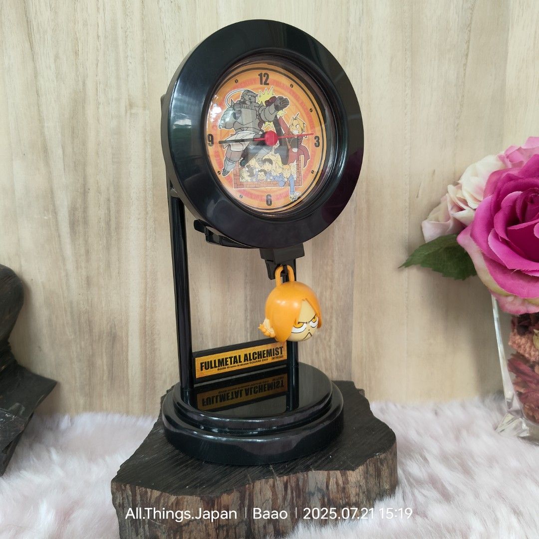 FULL METAL ALCHEMIST MINI PENDULUM CLOCK (Category: Clocks) located in Baao. Submitted by all.things.japan (Listing ID 1381968477, Image 1). Description: FULL METAL ALCHEMIST MINI PENDULUM CLOCK ✅BRAND NEW with box ✅ Collectible item ✅ From Japan Price: P480.00 Add Sf MOP: GCash/Landbank/Maya Dimensions (in inches): 9.0(H) x 4.75 inches.