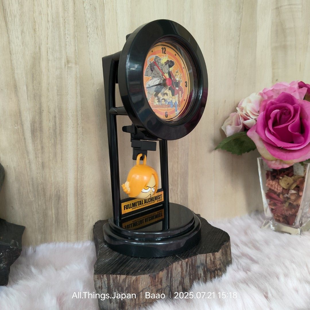 FULL METAL ALCHEMIST MINI PENDULUM CLOCK (Category: Clocks) located in Baao. Submitted by all.things.japan (Listing ID 1381968477, Image 2). Description: FULL METAL ALCHEMIST MINI PENDULUM CLOCK ✅BRAND NEW with box ✅ Collectible item ✅ From Japan Price: P480.00 Add Sf MOP: GCash/Landbank/Maya Dimensions (in inches): 9.0(H) x 4.75 inches.