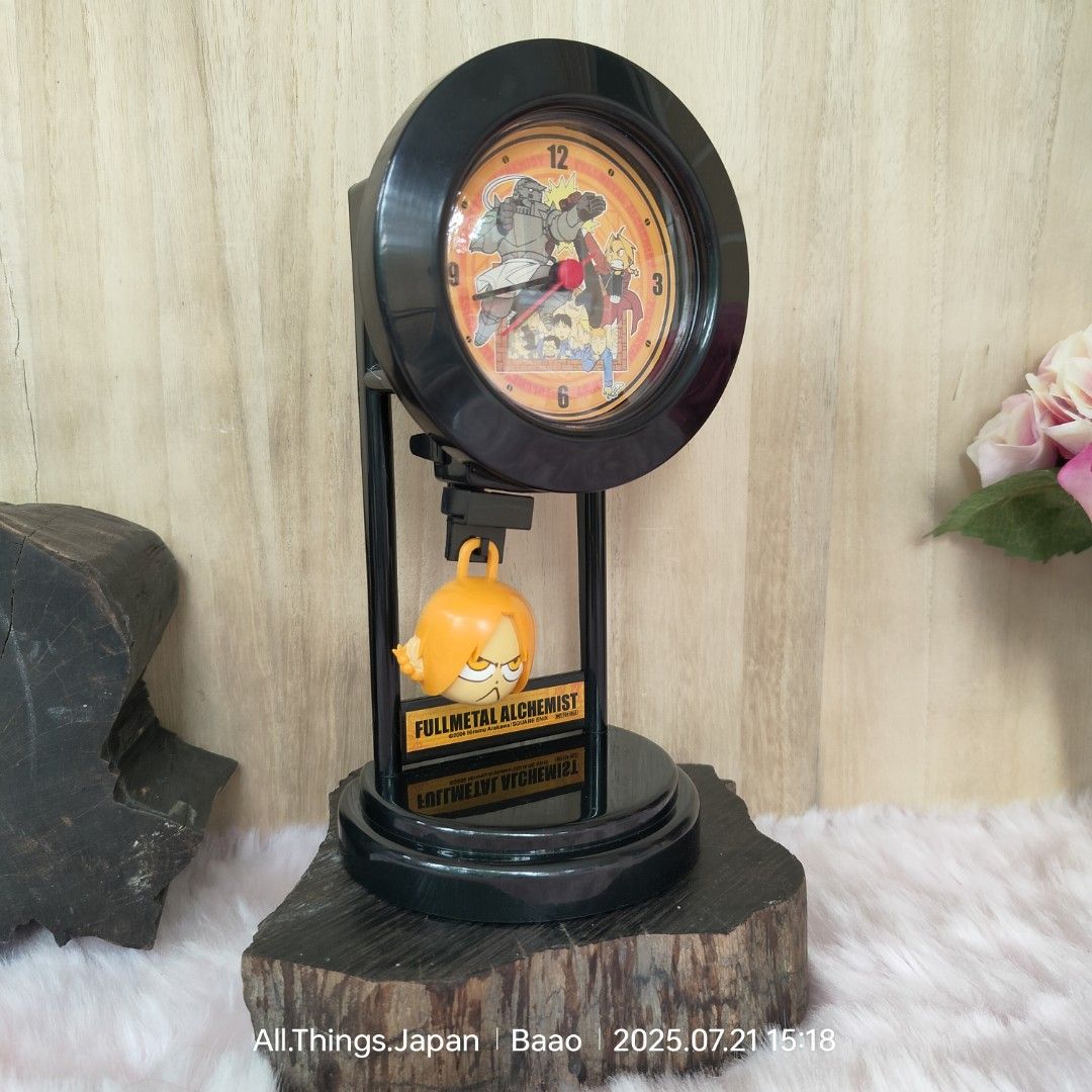FULL METAL ALCHEMIST MINI PENDULUM CLOCK (Category: Clocks) located in Baao. Submitted by all.things.japan (Listing ID 1381968477, Image 3). Description: FULL METAL ALCHEMIST MINI PENDULUM CLOCK ✅BRAND NEW with box ✅ Collectible item ✅ From Japan Price: P480.00 Add Sf MOP: GCash/Landbank/Maya Dimensions (in inches): 9.0(H) x 4.75 inches.