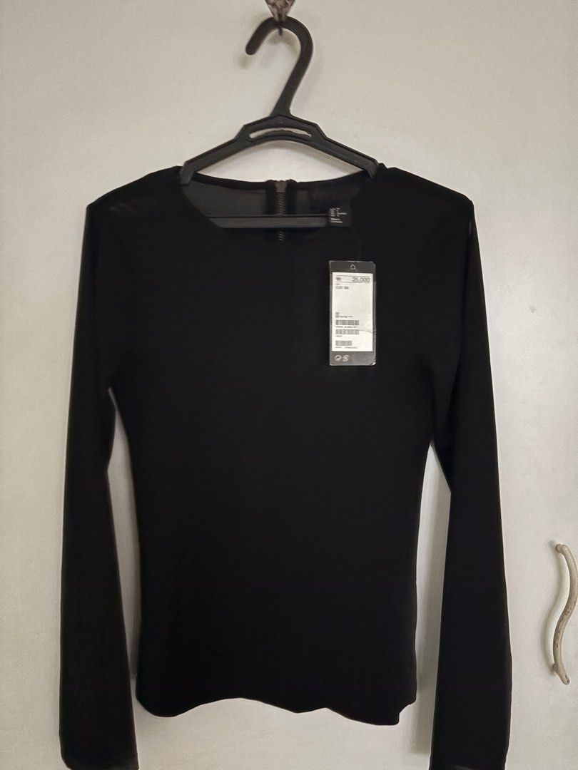 H&M BRAND NEW (Category: Longsleeves) located in Mandaluyong City. Submitted by itisntso (Listing ID 1381919530, Image 1). Description: BRAND NEW H&M longsleeves black top with sheer Size EUR 34.